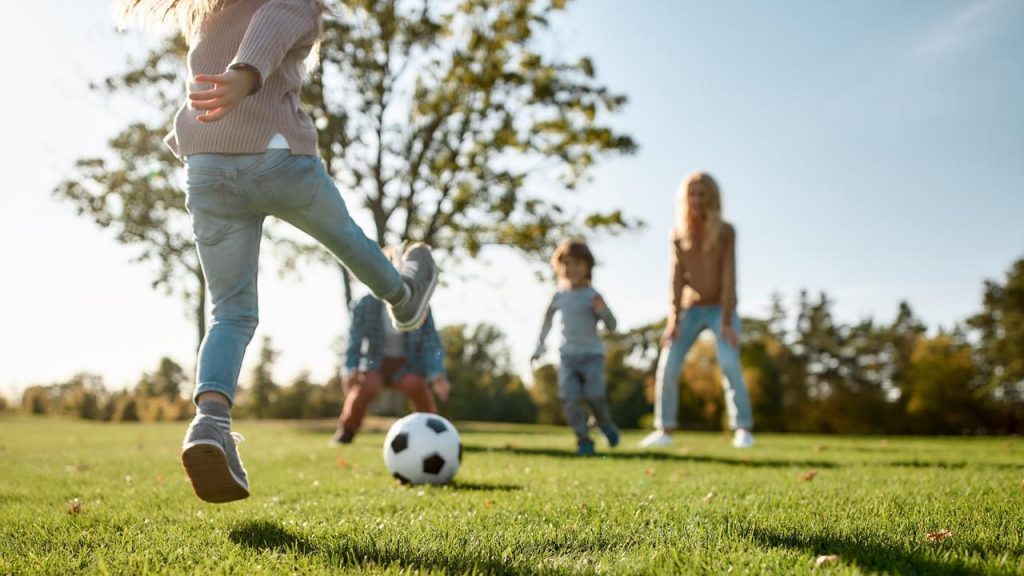 children playing soccer